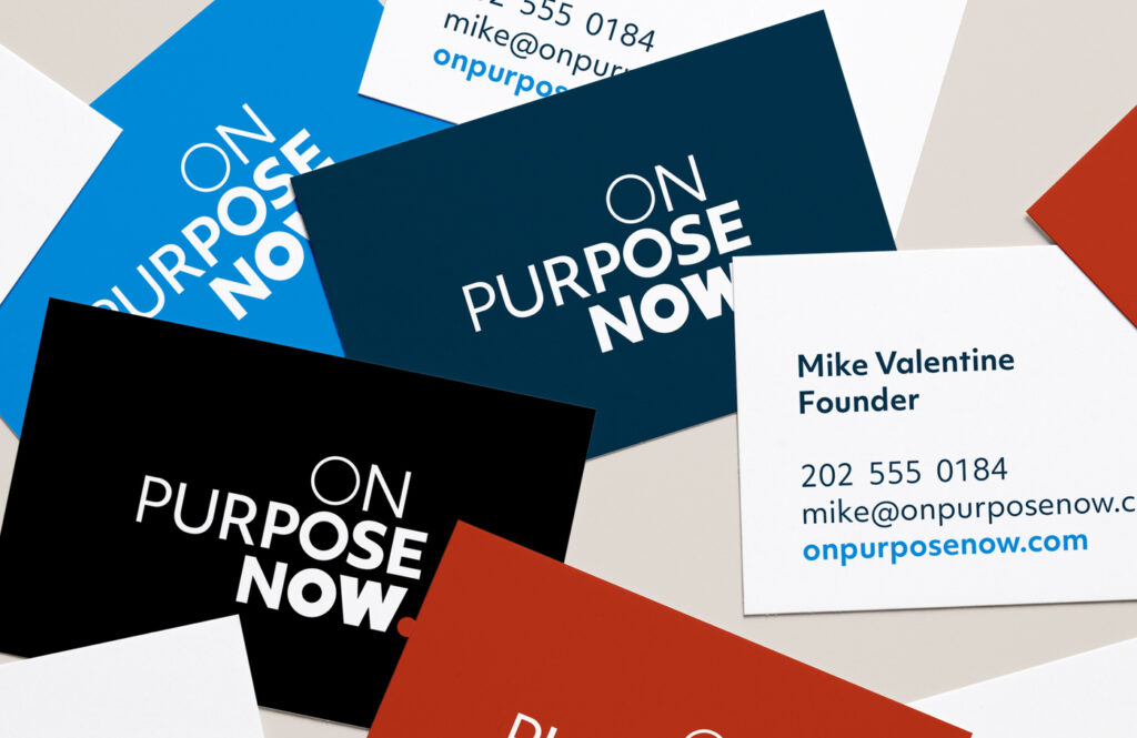On Purpose Now Brand Identity displayed on coaching brand business cards in blue, red, black, and white.