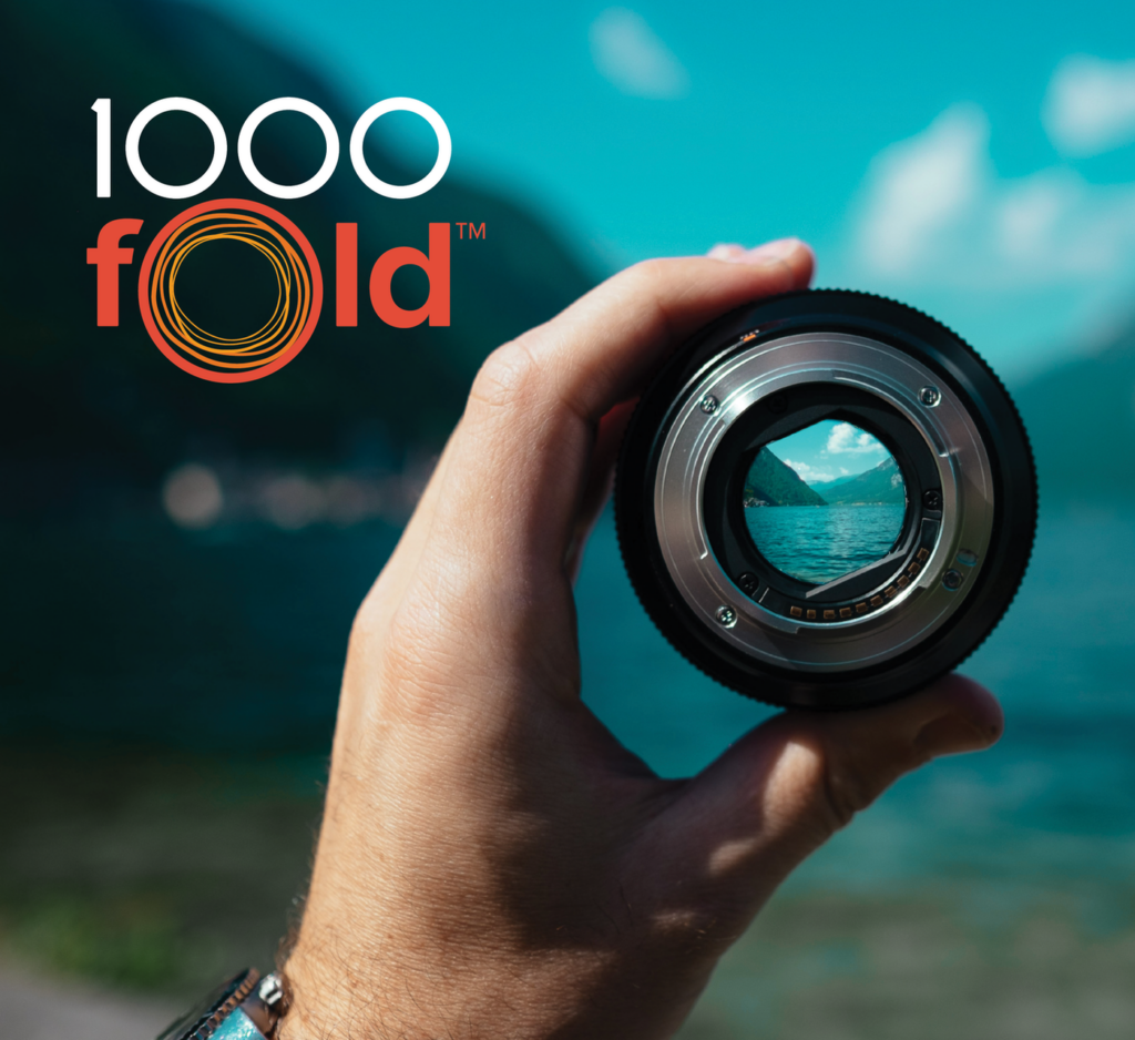 Thousandfold brand identity shown on an image of a lens.