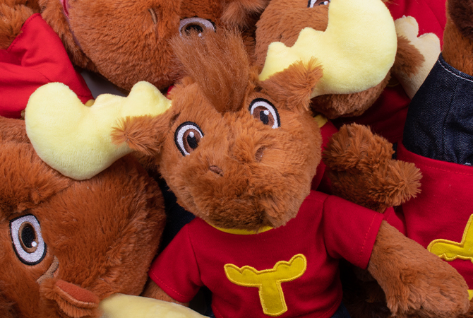 Tommy Moose plushies featuring the character design and updated brand storytelling. 